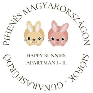 a happy birthday card with two rabbits in a wreath at Happy Bunnies Apartman I - Gunarasfürdő in Dombóvár