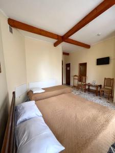Posteľ alebo postele v izbe v ubytovaní Hotel Zorepad
