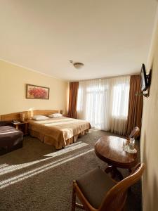 Posteľ alebo postele v izbe v ubytovaní Hotel Zorepad