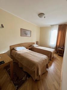 Posteľ alebo postele v izbe v ubytovaní Hotel Zorepad