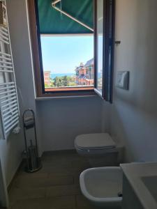 Koupelna v ubytování Andora Fronte Mare