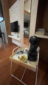 a hair dryer on a table in a room at IDEAL LOFT IN CENTRO TORINO in Turin