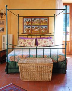 A bed or beds in a room at Poggio Imperiale Apartments