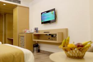 TV a/nebo společenská místnost v ubytování Royale Lalit Hotel Jaipur