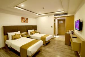 Postel nebo postele na pokoji v ubytování Royale Lalit Hotel Jaipur