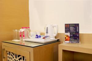Příslušenství pro přípravu čaje a kávy v ubytování Royale Lalit Hotel Jaipur