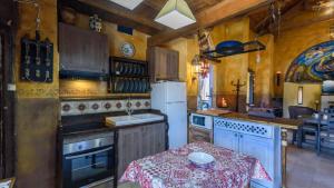 Kuchyň nebo kuchyňský kout v ubytování Ermita de las Eras Algarinejo by Ruralidays