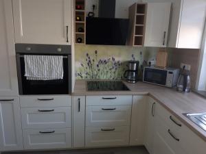 Kuchyň nebo kuchyňský kout v ubytování Ferienwohnung Finkenzeller