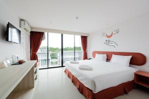 Postel nebo postele na pokoji v ubytování Moon Budget Hotel + 12 fotografií