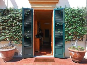 The facade or entrance of Poggio Imperiale Apartments