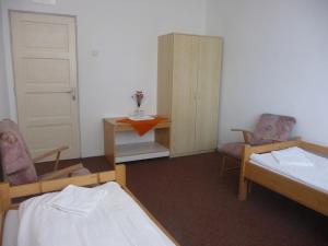 Postel nebo postele na pokoji v ubytování Vila Diakonia