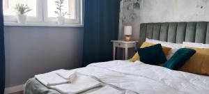 Łóżko lub łóżka w pokoju w obiekcie Tabago Studio 4 Katowice Superjednostka