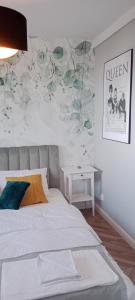 Łóżko lub łóżka w pokoju w obiekcie Tabago Studio 4 Katowice Superjednostka