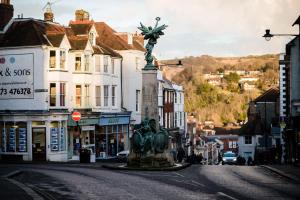 a statue in the middle of a city street at Edward's Burrow in Lewes