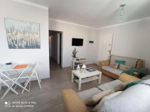 TV a/nebo společenská místnost v ubytování Ventana al Mar
