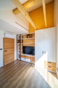 Postel nebo postele na pokoji v ubytování Holiday House U Hájenky 7L Lipno Home