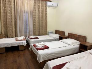 Säng eller sängar i ett rum på Adamyan 11 hotel