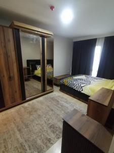 Krevet ili kreveti u jedinici u objektu Two Sweet Rooms With living Terrace Mix