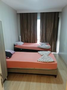 Krevet ili kreveti u jedinici u objektu Two Sweet Rooms With living Terrace Mix