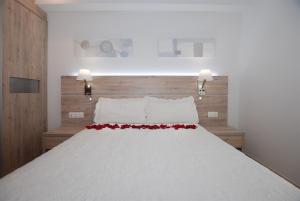 Postel nebo postele na pokoji v ubytování Apartments Gran VP