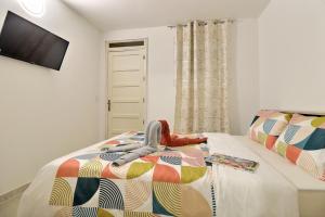 Posteľ alebo postele v izbe v ubytovaní Chambre cosy jo