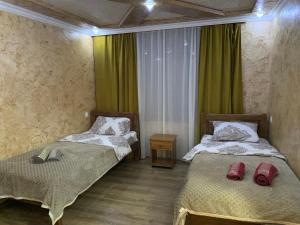 Postel nebo postele na pokoji v ubytování Guest House Diana + 27 fotografií