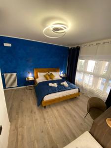 מיטה או מיטות בחדר ב-Hotel Plaza Ungheria