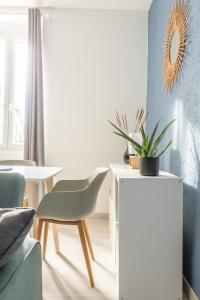 Posedenie v ubytovaní Cosy T2 rénové, proche centre-ville-Fibre/Netflix