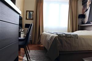 Voodi või voodid majutusasutuse Crown apartman toas