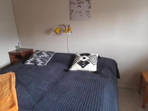 En eller flere senge i et værelse på Pieksämäellä saunallinen rivitalokaksio