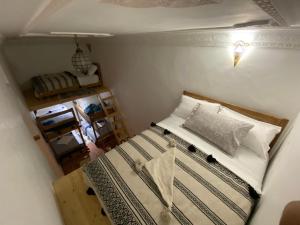 Postel nebo postele na pokoji v ubytování Hostel Capital