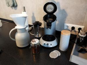 a counter with a blender and other appliances on it at Salzufler Wohntraum in Bad Salzuflen