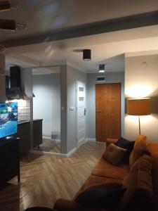 Telewizja i/lub zestaw kina domowego w obiekcie Tabago Studio 4 Katowice Superjednostka