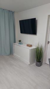 Et tv og/eller underholdning på APARTAMENTO BUNGAMERICA n112