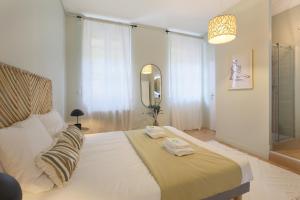 Posteľ alebo postele v izbe v ubytovaní expat renting - Le Barcelone - Compans - Parking
