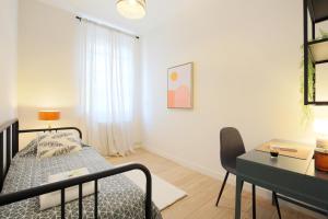 Posteľ alebo postele v izbe v ubytovaní expat renting - Le Barcelone - Compans - Parking
