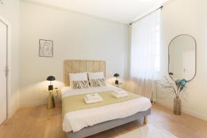 Posteľ alebo postele v izbe v ubytovaní expat renting - Le Barcelone - Compans - Parking