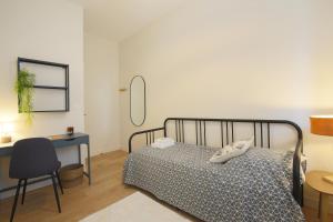 Posteľ alebo postele v izbe v ubytovaní expat renting - Le Barcelone - Compans - Parking