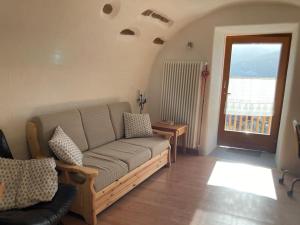 A seating area at CASA DIAF appartamento incantevole Carano Ville di Fiemme