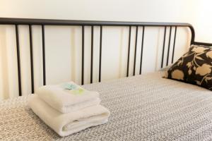 Posteľ alebo postele v izbe v ubytovaní expat renting - Le Barcelone - Compans - Parking