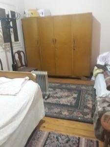 Postel nebo postele na pokoji v ubytování منطقة الاستاد بطنطا