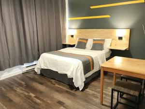 Postelja oz. postelje v sobi nastanitve Duncan Motel