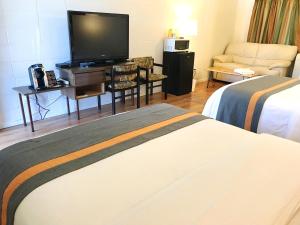 Postelja oz. postelje v sobi nastanitve Duncan Motel