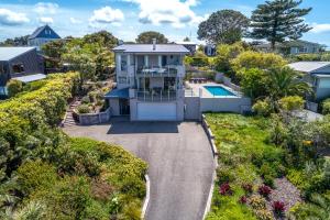 an aerial view of a house with a driveway at Hauraki Vista in Blackpool