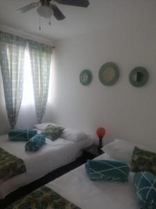 เตียงในห้องที่ Apartasol 102c Tebaida Quindio