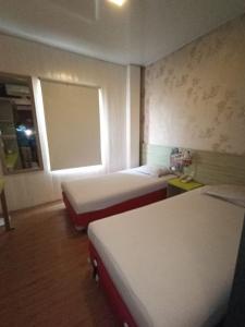 Postel nebo postele na pokoji v ubytování Hotel Aleander