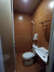 Koupelna v ubytování Hotel Aleander