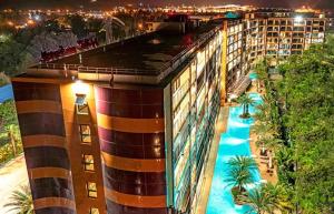 an aerial view of a hotel with a swimming pool at Квартира in Ban Bo Sai Klang