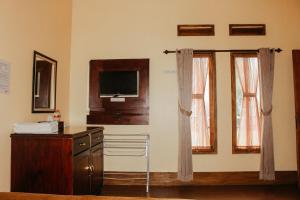TV a/nebo společenská místnost v ubytování SM Bromo Hotel