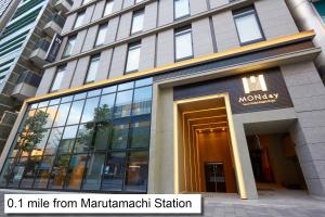 a building with a door in front of it at hotel MONday Kyoto Karasuma Nijo in Kyoto